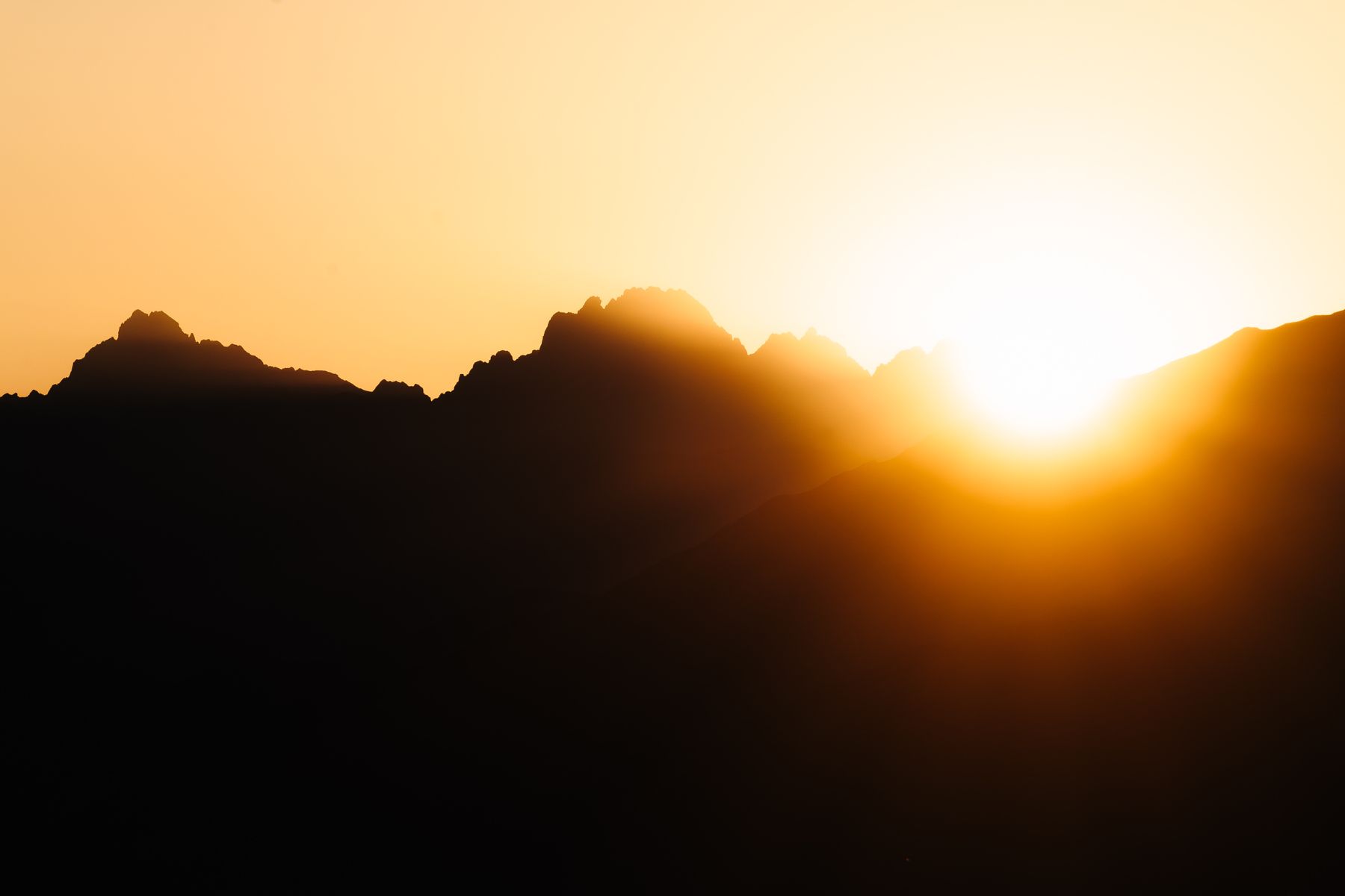 A mountain ridge at sunrise